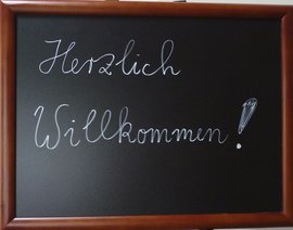 Schild "Herzlich Willkommen"